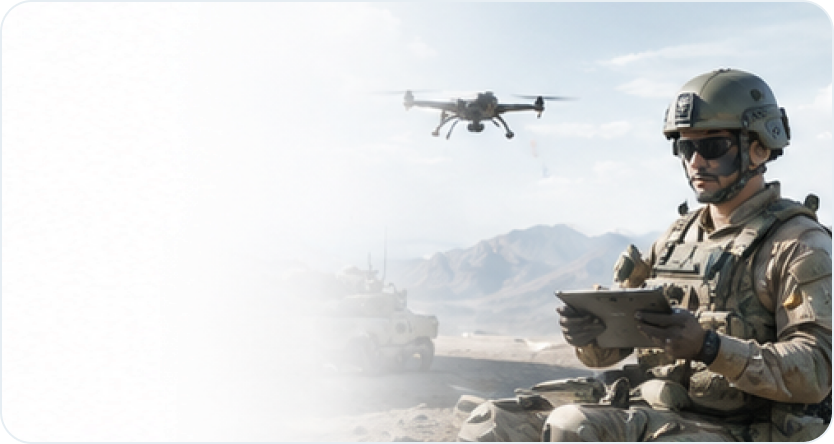 Soldier using a tablet beside a hovering unmanned aircraft