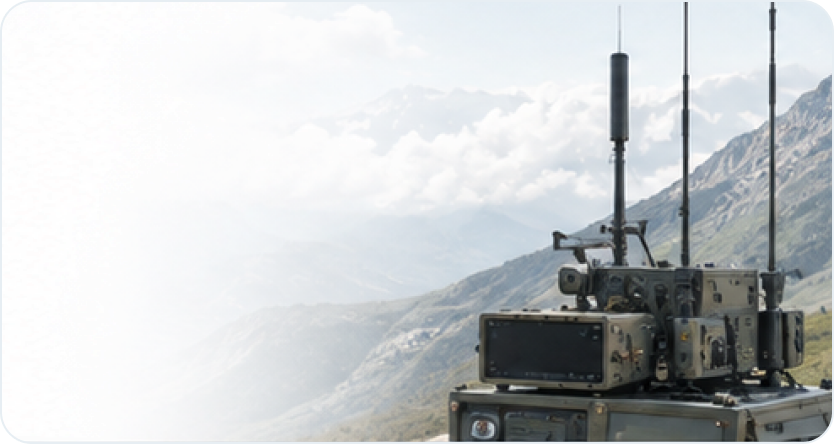 Unmanned ground vehicle operating beside an armoured platform